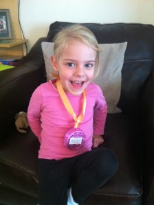 Ava's pink medal